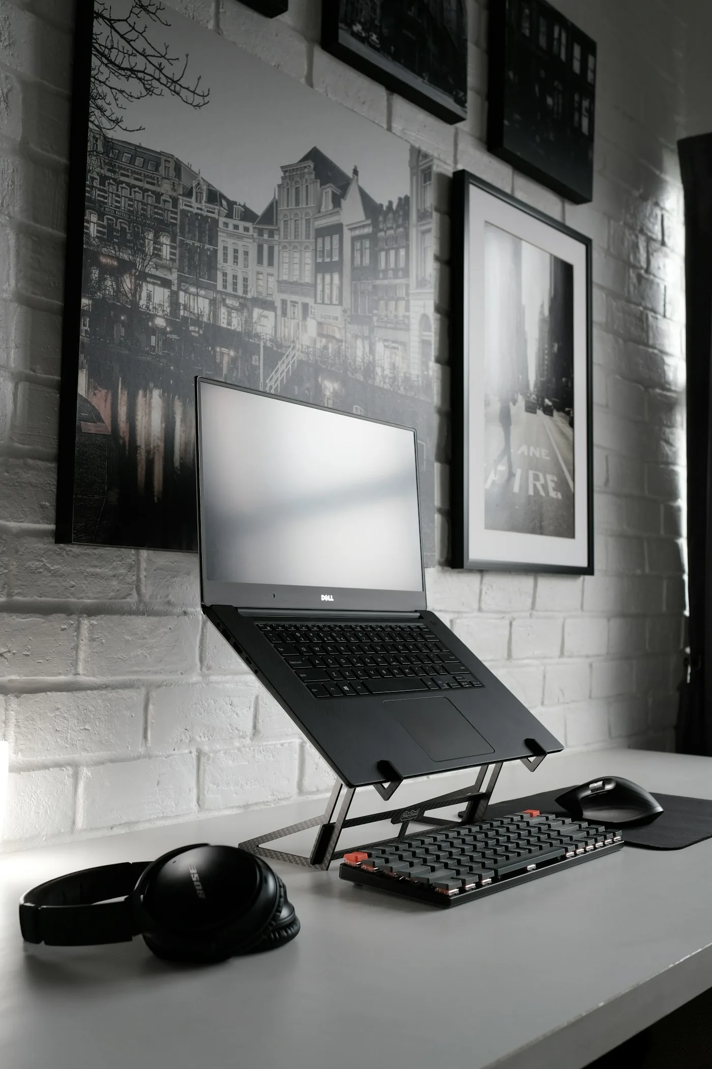 Laptop placed on adjustable ergonomic stand